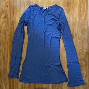 Blue long sleeve top. Very stretchy. Pit to pit 16”. (2” give)